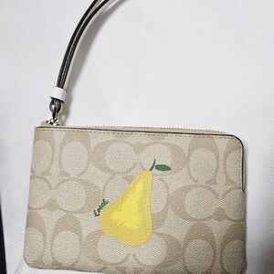 Coach Beige Wristlet with Yellow Pear Motif